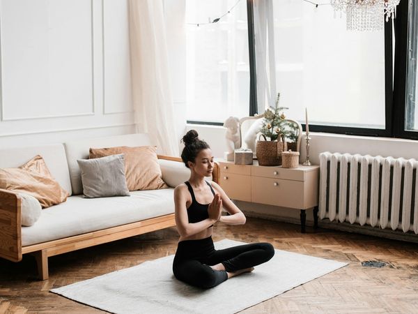 Atmospheric yoga studio with soft warm lighting